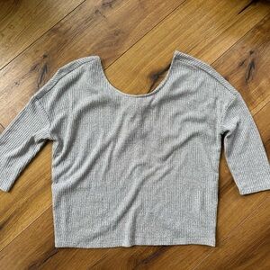 Gentle fawn light knit shirt.